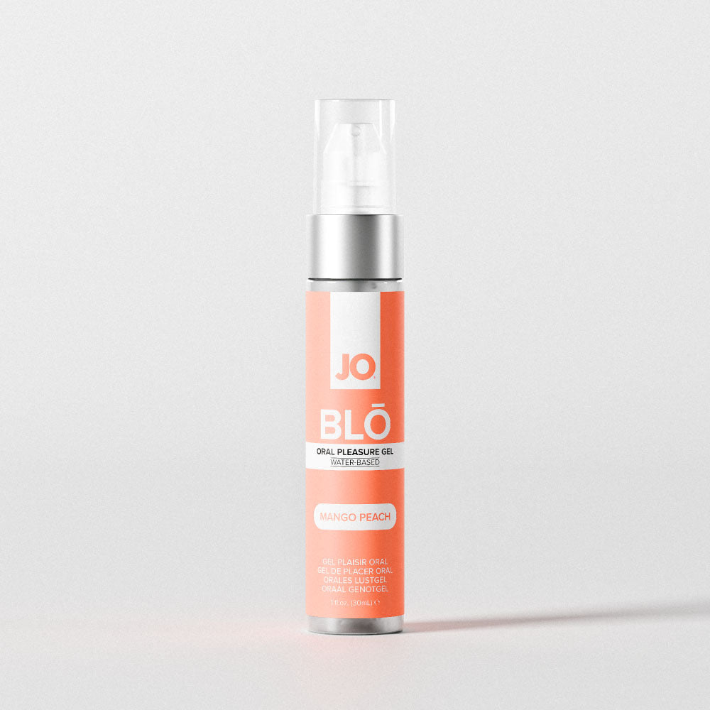 JO BLO Mango Peach pump bottle standing alone on a pale grey background