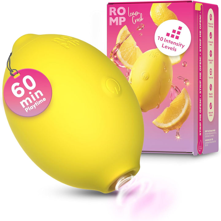 ROMP Lemon Crush yellow lemon-shaped clitoral stimulator in front of its pink retail box