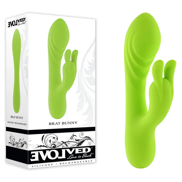 Evolved Brat Bunny retail box beside the lime green rabbit vibrator, ribbed shaft and ears
