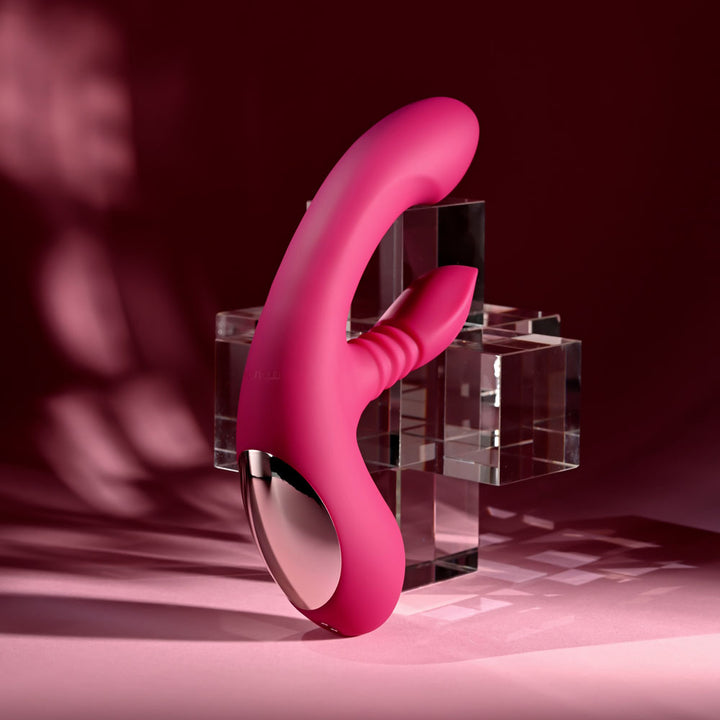 Evolved Gentle Persuasion in Pink upright and angled, showing the chrome plate in the handle