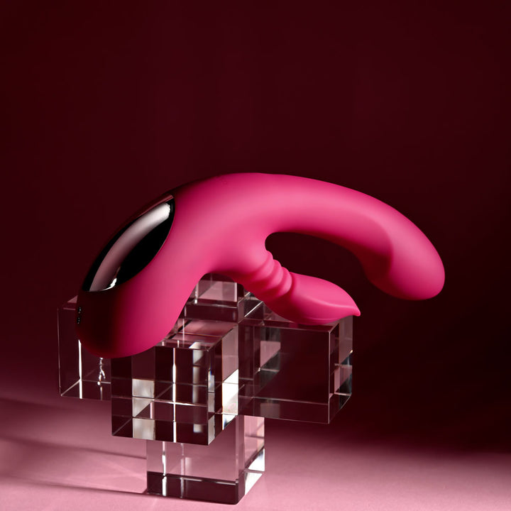 Evolved Gentle Persuasion in Pink lying flat with the chrome handle plate to the left