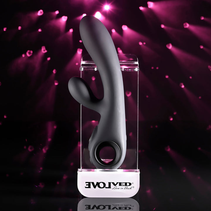 Evolved Black Magic in Black on its stand, turned to show the open ring handle