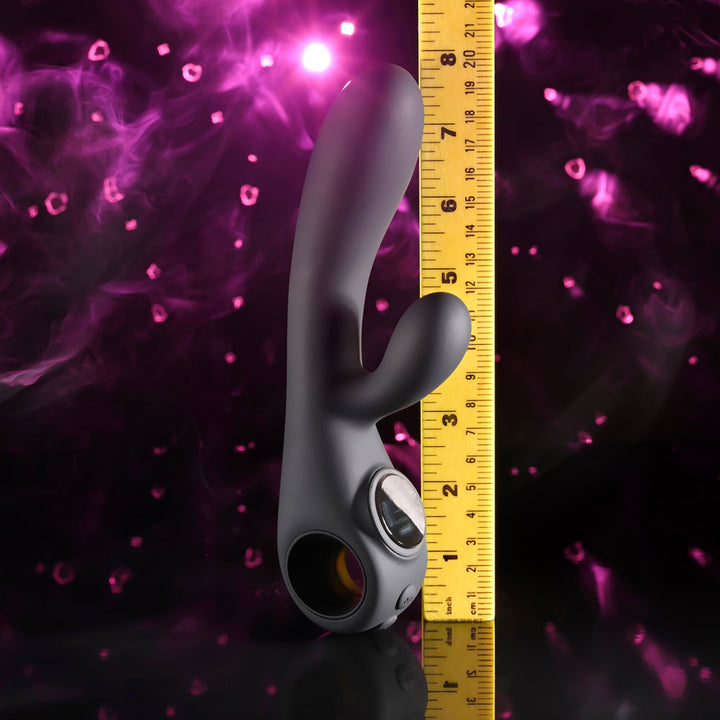 Evolved Black Magic in Black upright against a tape measure, reading about 8 inches