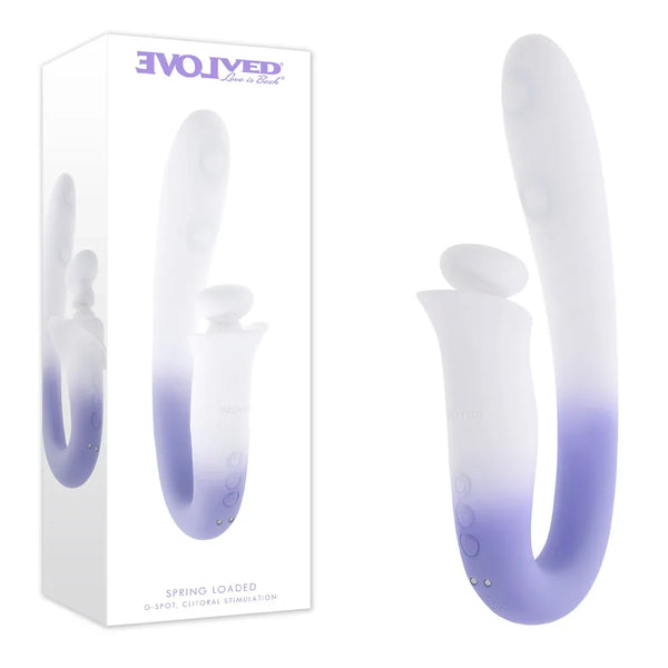 Evolved Spring Loaded retail box beside the multi-tapping vibrator in a white-to-lilac ombre