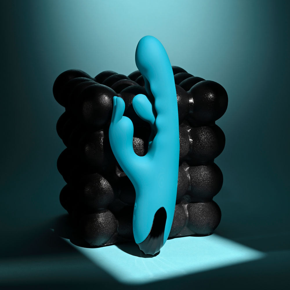 Evolved Bunny Tapper in Teal upright straight on, showing the slim curved shaft