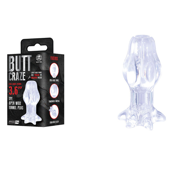 Butt Craze 3.6 inch tunnel plug in Clear, closed petal tip, beside its black box