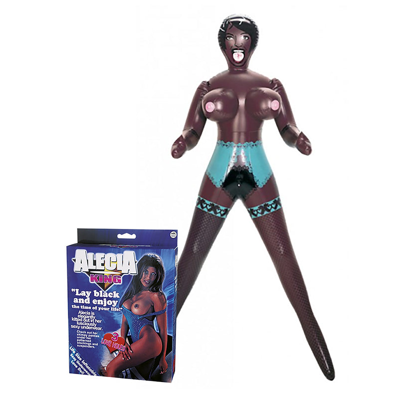 Alecia King inflatable love doll standing, wearing printed lingerie, beside her box