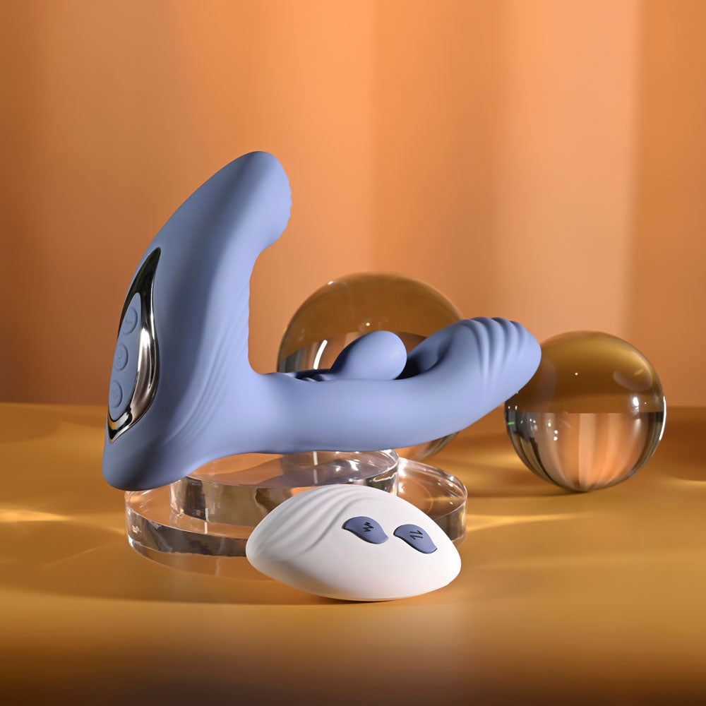 Gender X Flapjack in Blue, side view showing the button panel on the base