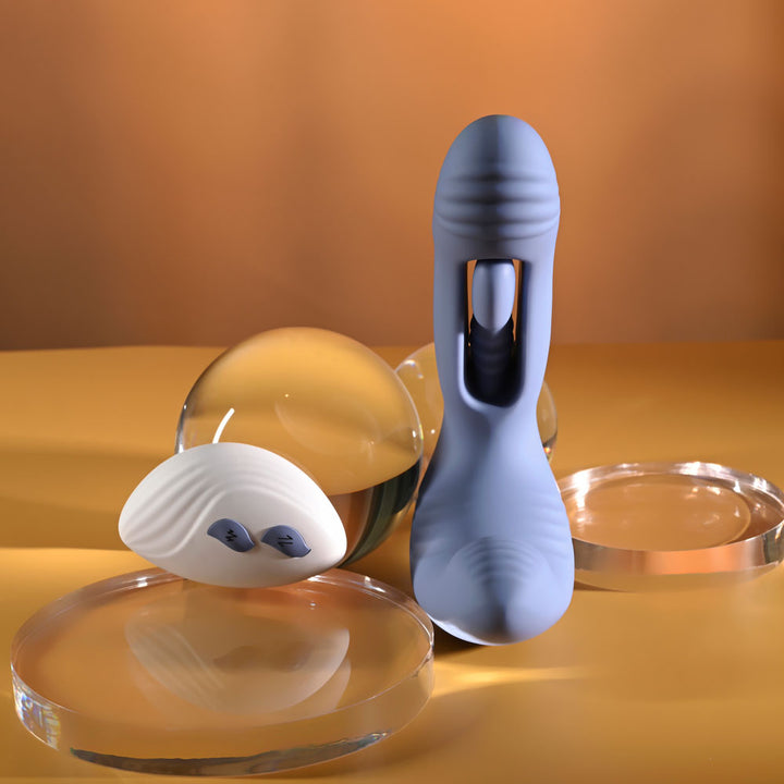 Gender X Flapjack in Blue stood on end showing the slot in the shaft, remote beside