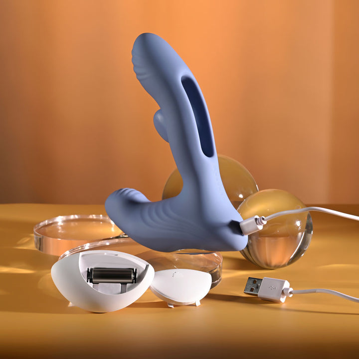 Gender X Flapjack in Blue on USB charge, remote open showing its battery