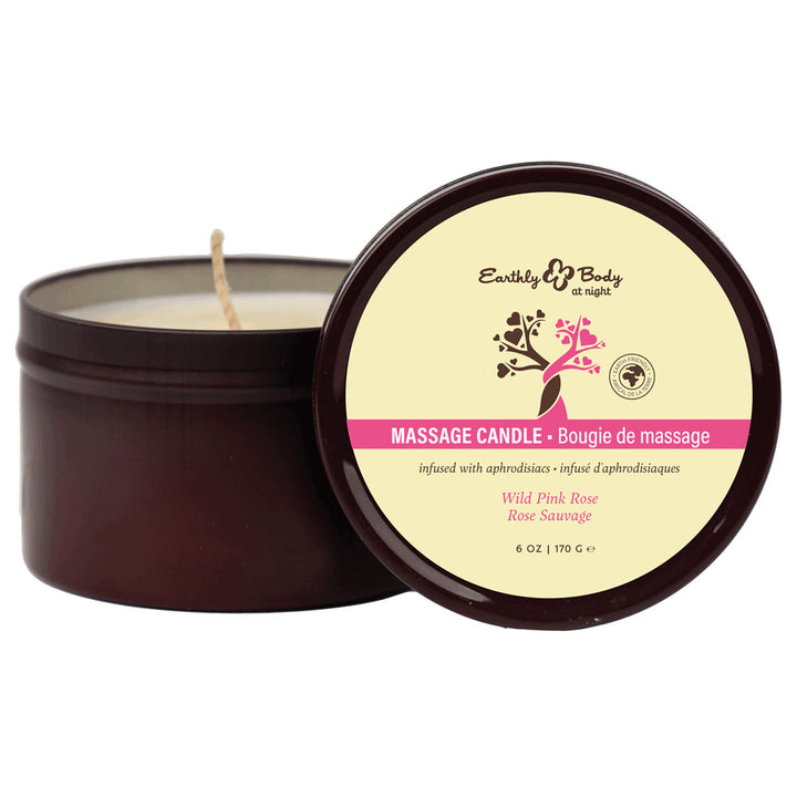 Earthly Body Massage Candle, open tin behind its pink Wild Pink Rose lid label