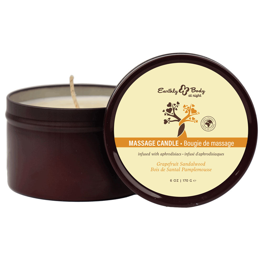 Earthly Body Massage Candle, open tin behind its Grapefruit Sandalwood lid label
