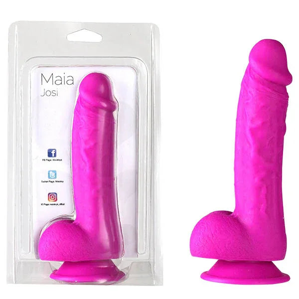 Maia Josi 20.3 cm realistic dong in bright pink, beside its Maia blister pack