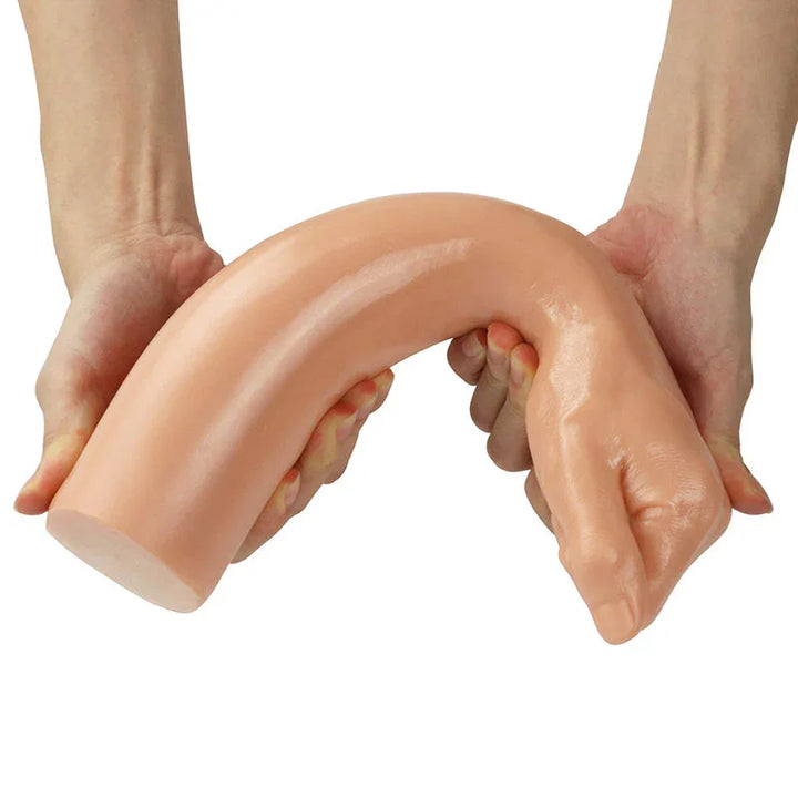 Two hands bending the Bitch Fist arm dildo in half to show how flexible it is