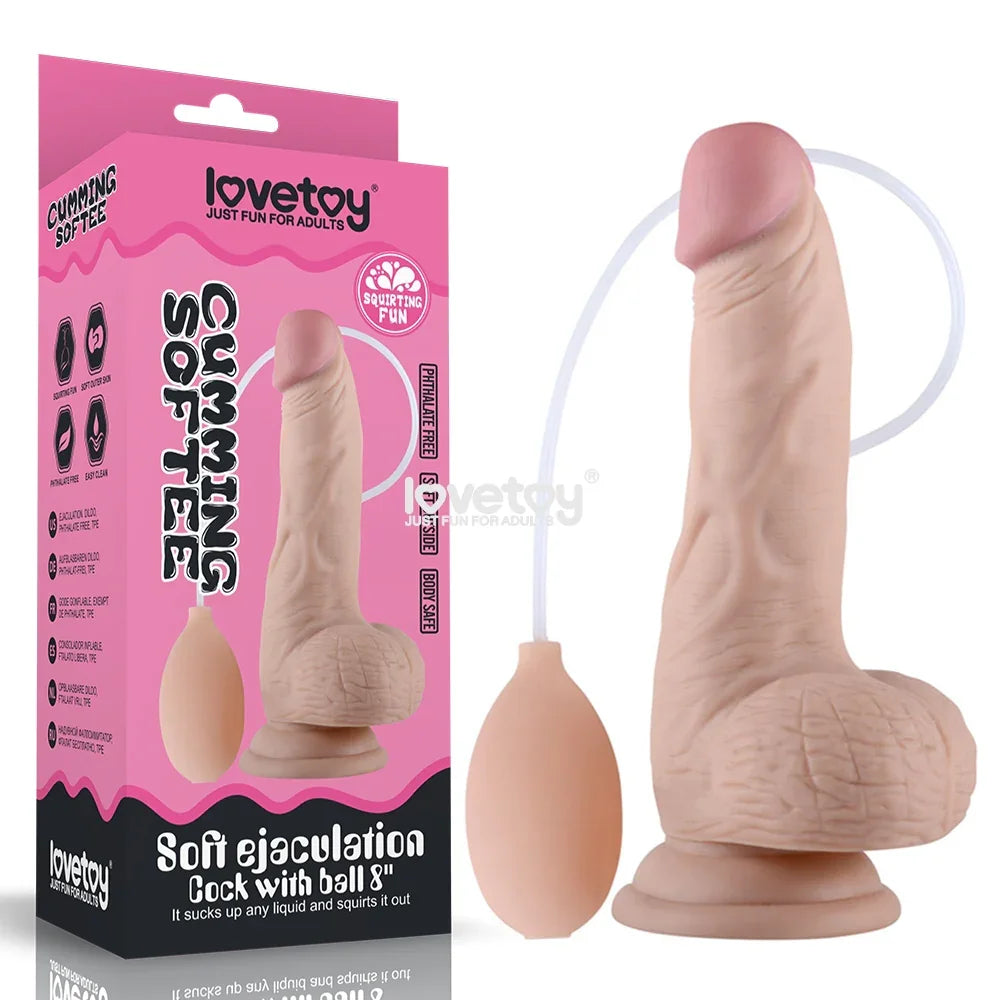 Lovetoy Cumming Softee 8 inch dong with balls in Flesh, next to its pink box and squeeze bulb