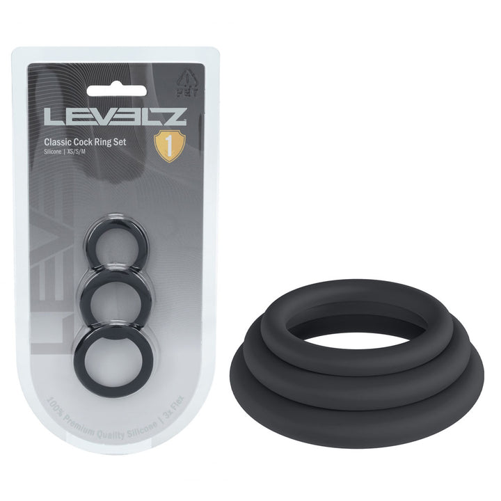 LEVELZ Classic Silicone Cock Ring Set of 3 XS/S/M in Black, blister pack beside the three stacked rings