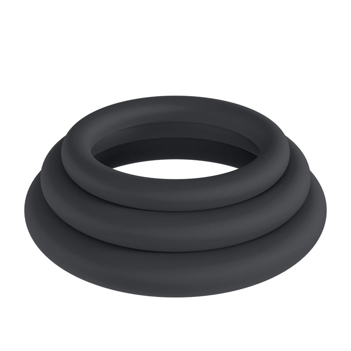 LEVELZ Classic Silicone Cock Ring Set of 3 XS/S/M in Black, the three plain rings stacked on white