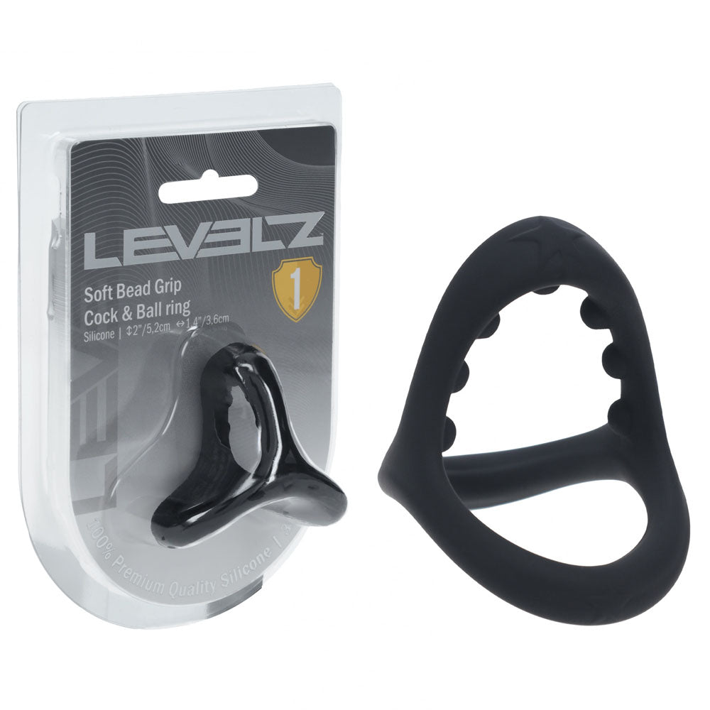 LEVELZ Soft Bead Grip Cock & Ball Ring in Black, blister pack beside the beaded-grip ring on white