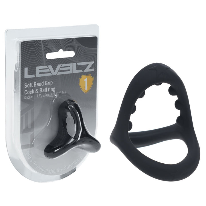 LEVELZ Soft Bead Grip Cock & Ball Ring in Black, blister pack beside the beaded-grip ring on white