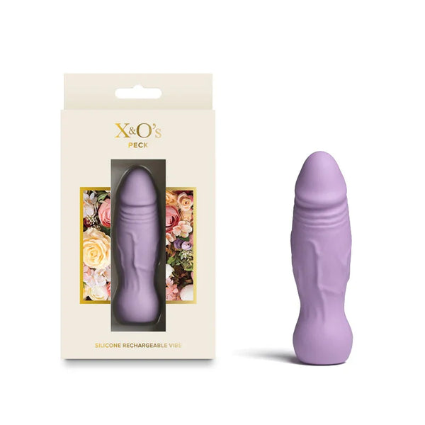X and O's Peck rechargeable bullet in Lavender, sculpted shaft, beside its floral box