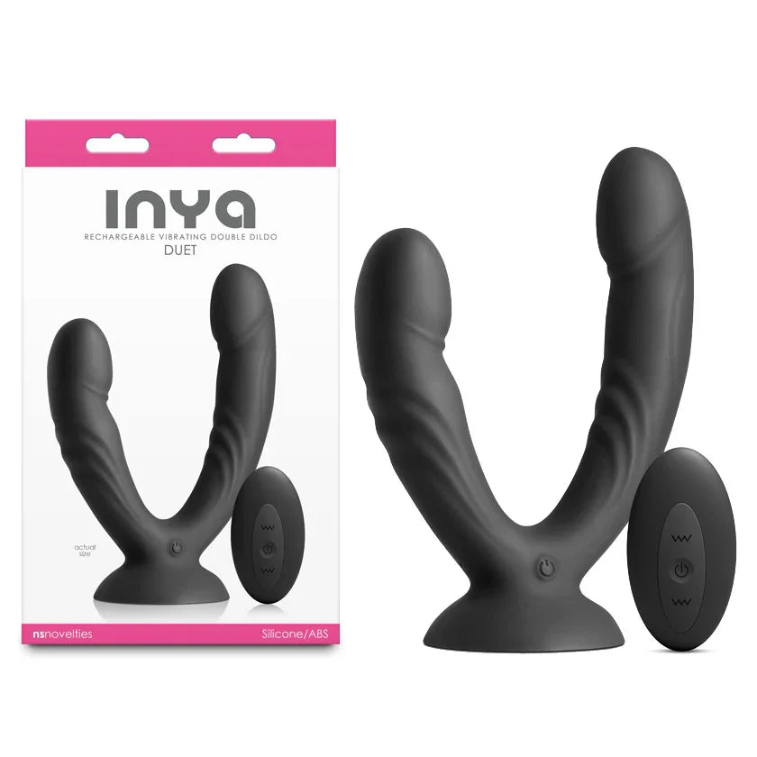 INYA Duet vibrating double dildo in Black with its remote, beside the INYA box