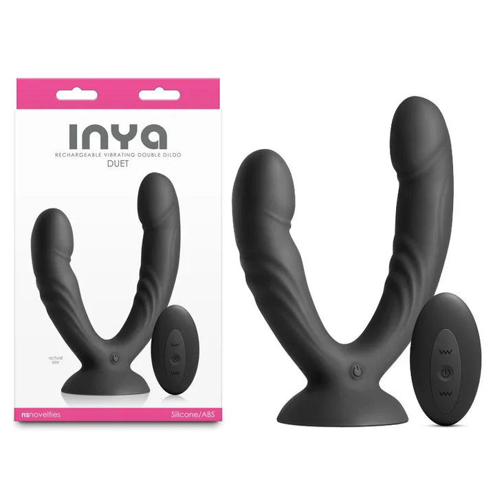 INYA Duet vibrating double dildo in Black with its remote, beside the INYA box