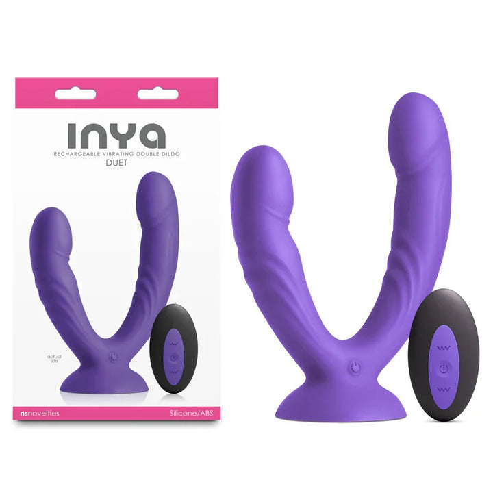 INYA Duet vibrating double dildo in Purple with its remote, beside the INYA box