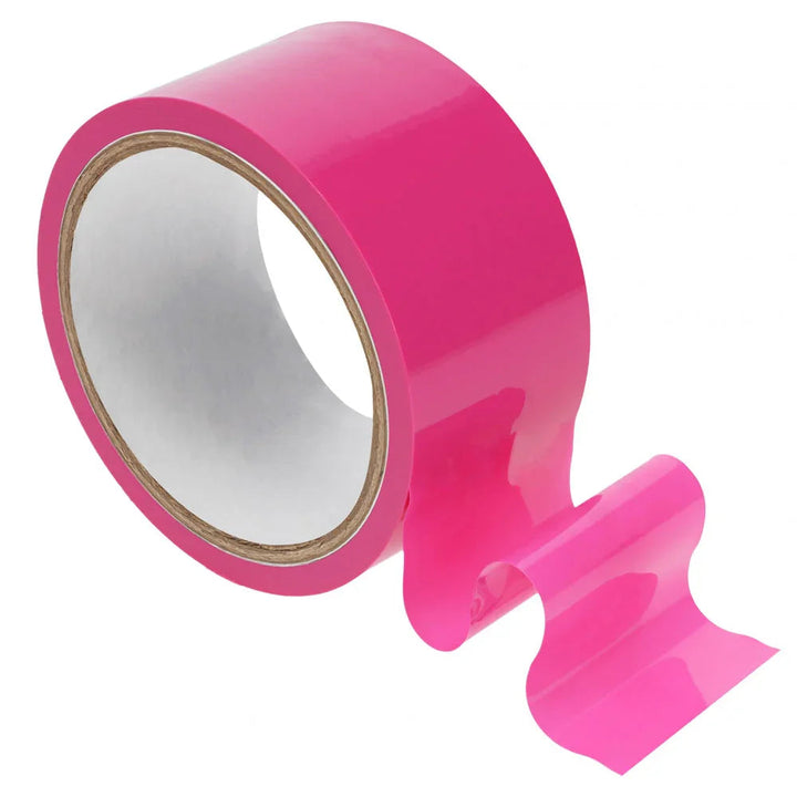 OUCH! PVC Non-Stick Bondage Tape 20m in Pink, glossy pink roll with a length unwound beside it