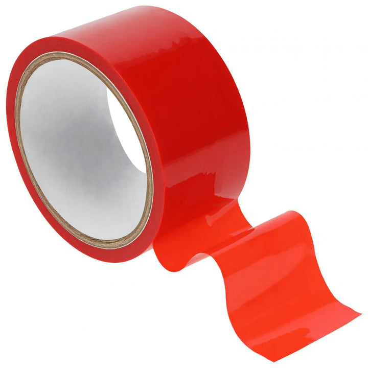 OUCH! PVC Non-Stick Bondage Tape 20m in Red, glossy red roll with a length unwound beside it