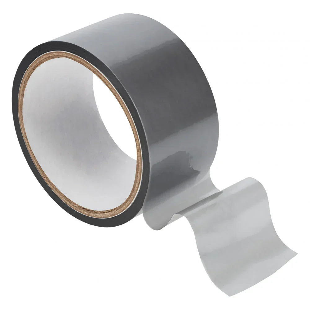 OUCH! PVC Non-Stick Bondage Tape 20m in Silver, glossy grey roll with a length unwound beside it
