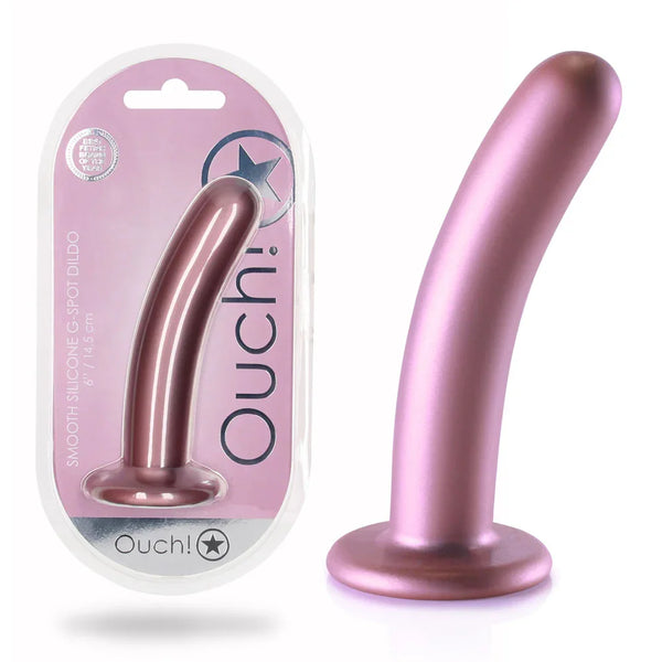 OUCH! 15.2 cm Silicone G-Spot Dildo in Rose Gold, blister pack beside the curved dildo on its round base