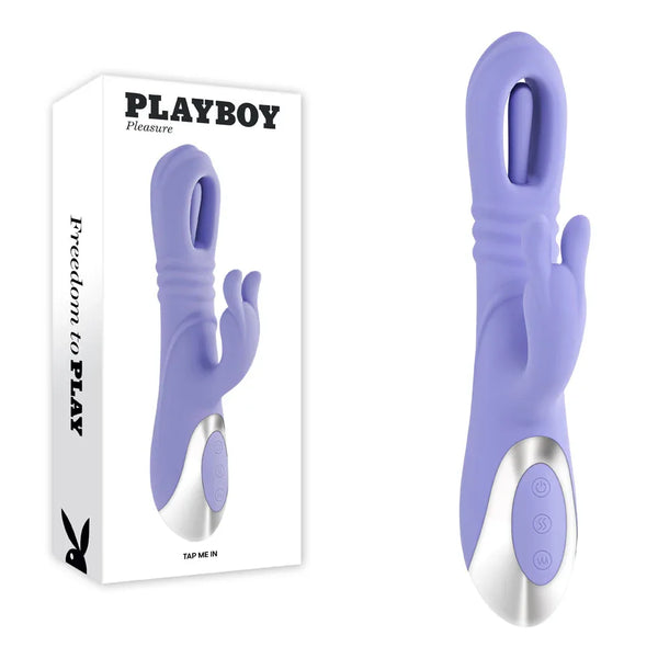 Playboy Pleasure Tap Me In tapping rabbit vibrator in purple beside its retail box