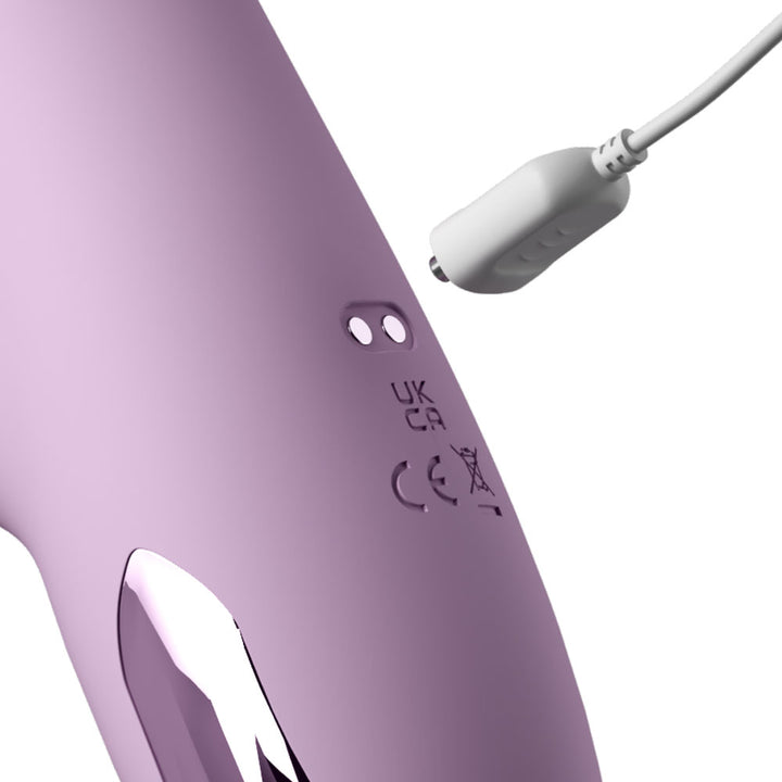 Magnetic charging cable held to the contacts on the G-Touch Pulse Pro handle