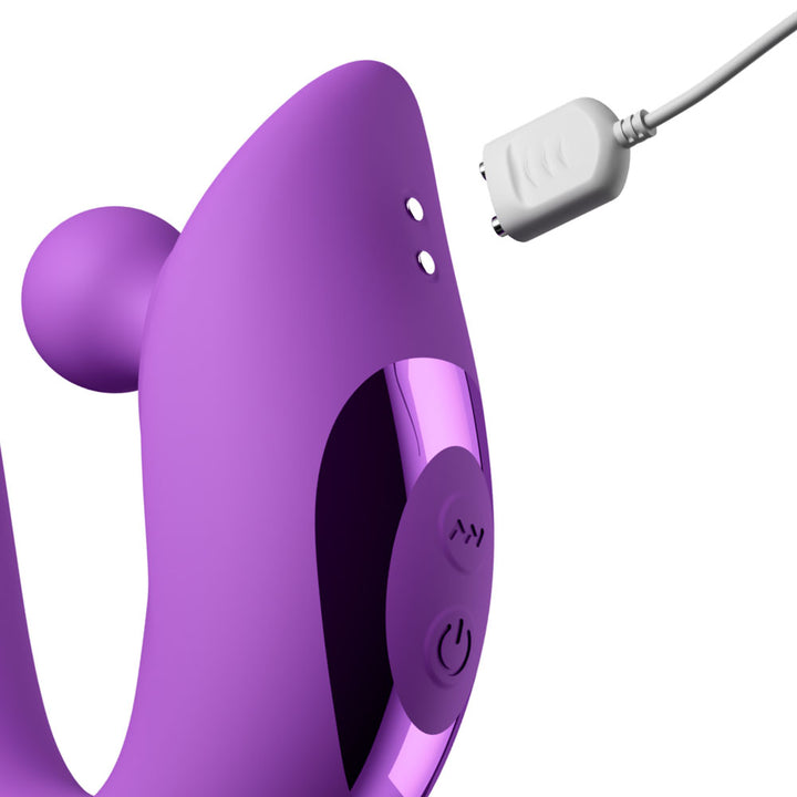 Magnetic USB charger meeting the charging pins on the Harmoni Pro handle