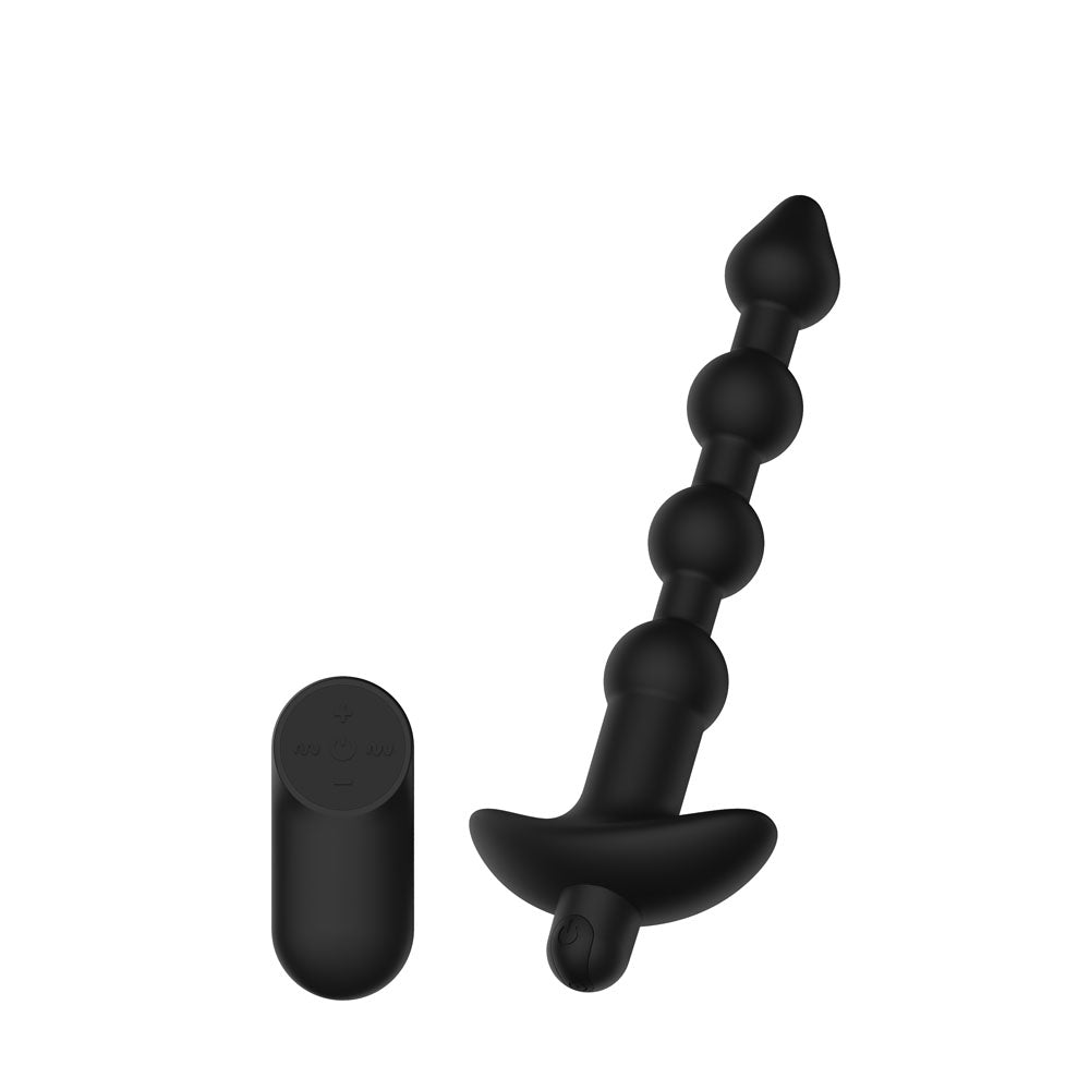 Passion Play Vibrating Anal Beads in Black angled to the right, remote at the left