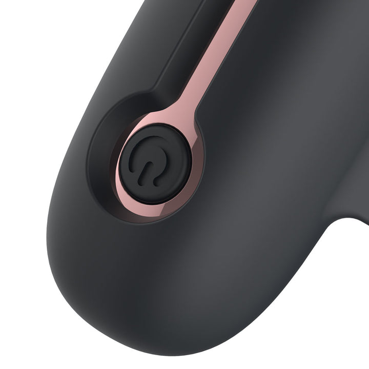 Close-up of the Black Passion Play Finger Vibe control button and its rose gold trim
