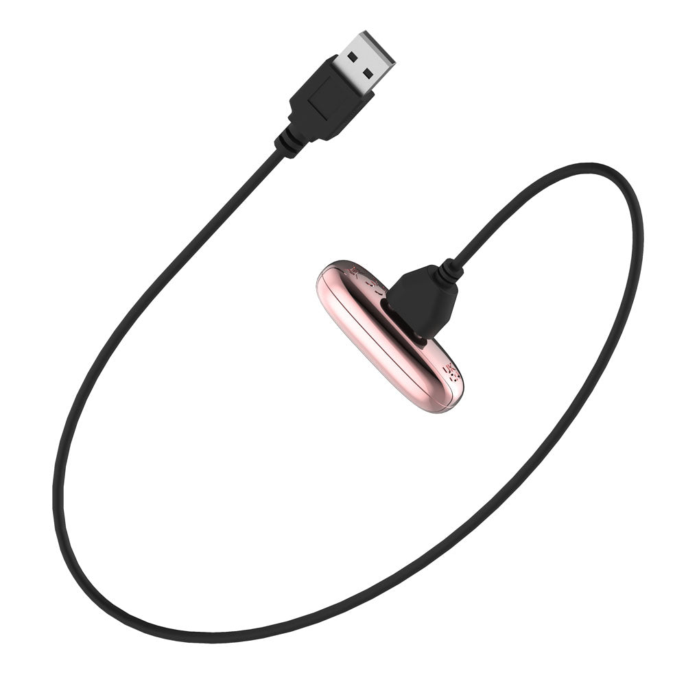 Passion Play Finger Vibe in Black with its magnetic USB charging cable clipped on