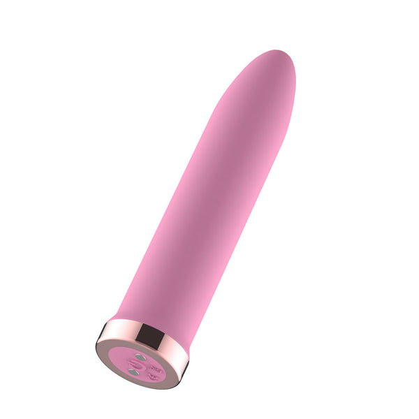 Passion Play Rechargeable Vibrating Bullet in Pink tilted to show the rose gold charging base