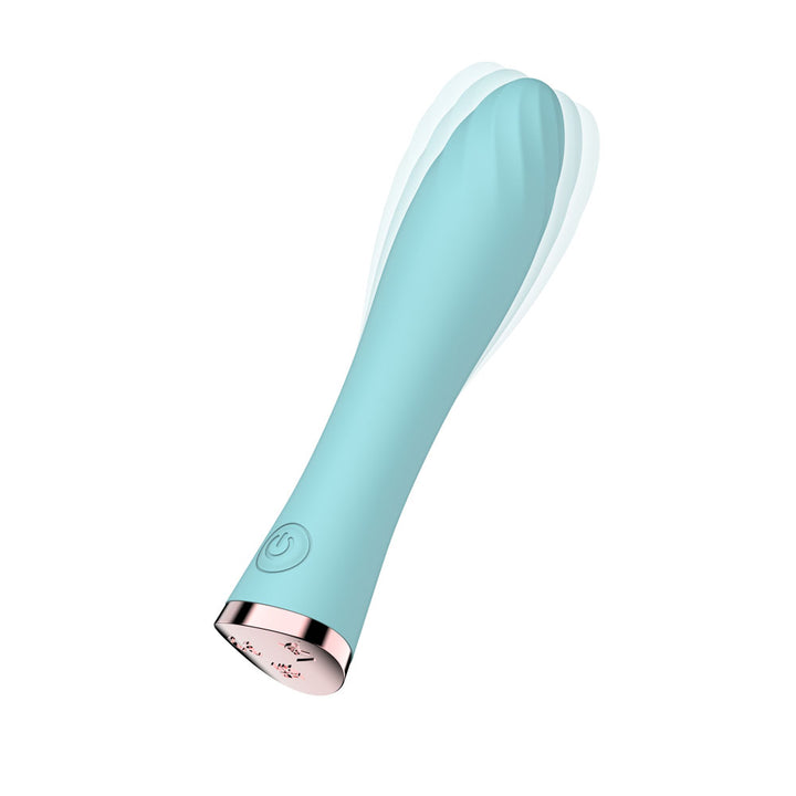 Passion Play Ultra Power Vibrating Bullet in Blue with motion blur at the swirled tip