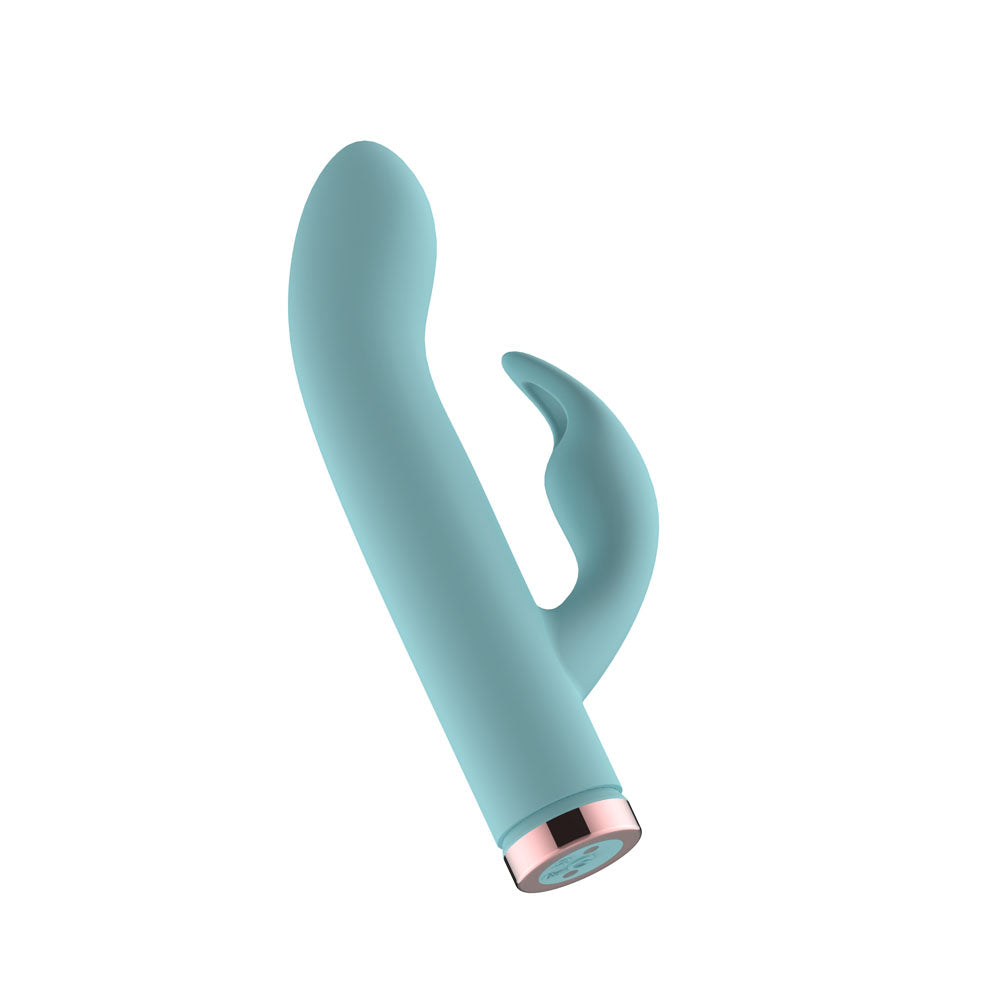 Passion Play Silicone Rabbit Vibrator in Blue tilted, button on the rose gold base in view