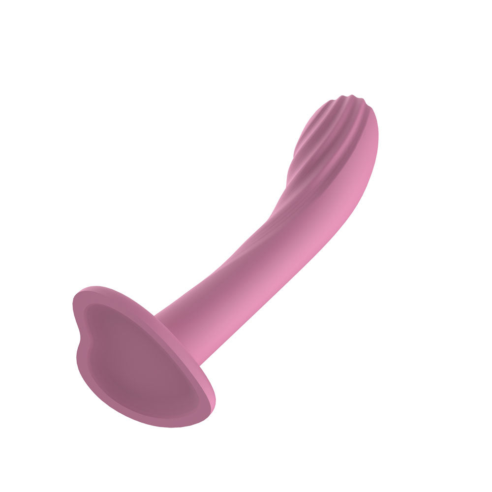 Passion Play Textured Dildo in Pink lying at an angle, ridged tip to the upper right