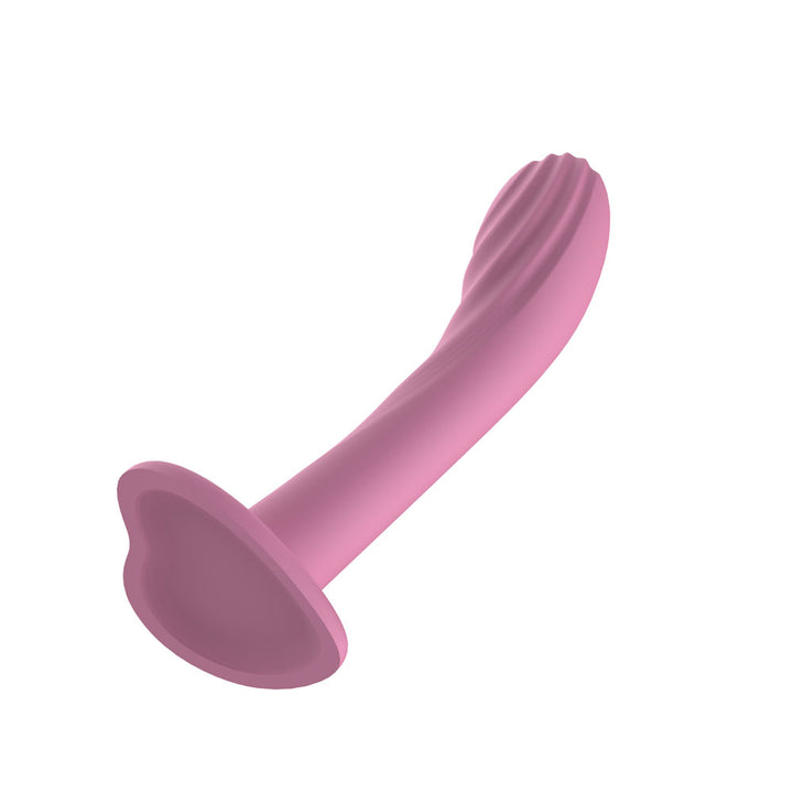 Passion Play Textured Dildo in Pink lying at an angle, ridged tip to the upper right