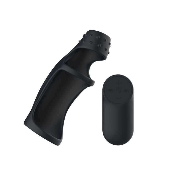 Passion Play Cockring Sleeve in Black angled from the other side, remote at right
