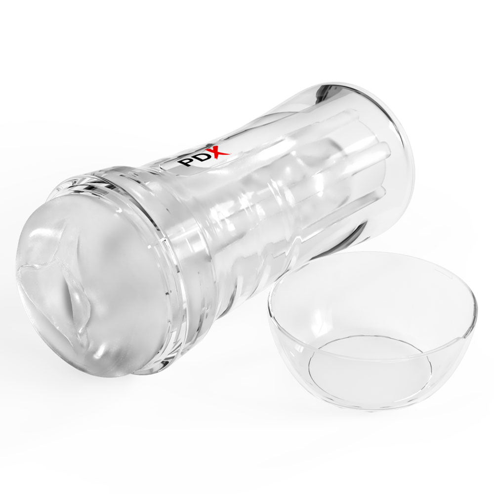 Super Luscious Lips stroker lying on its side next to the detached clear cap