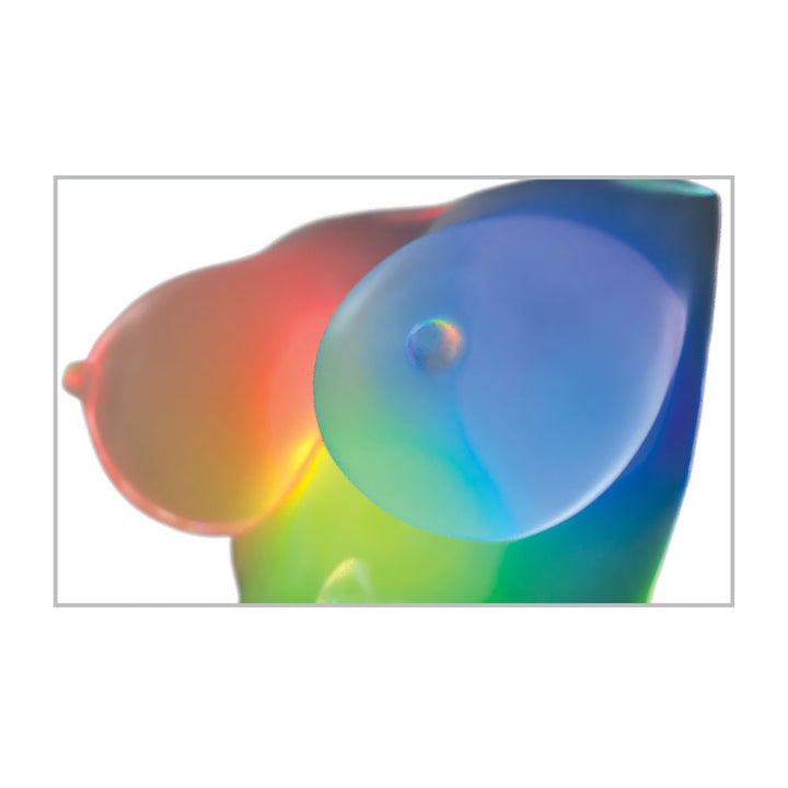 Close-up of the Go-Go Bator breasts glowing red, blue and green