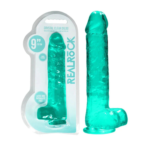 REALROCK 22.9 cm Realistic Dildo with Balls in Turquoise, blister pack beside the jelly-clear dildo