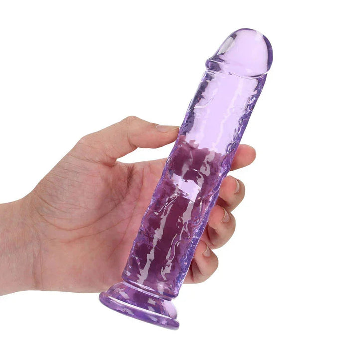 REALROCK 18 cm Straight Dildo in Purple, held in one hand to show its length