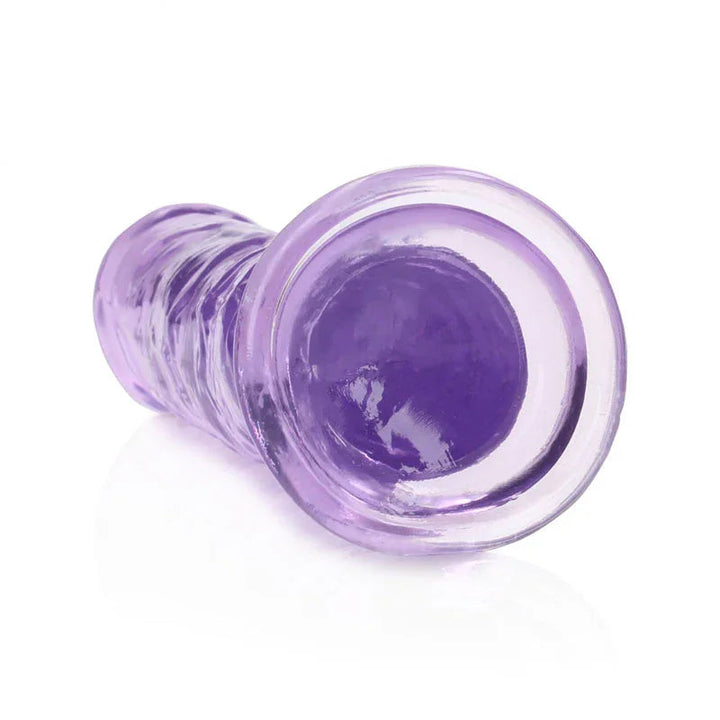 REALROCK 18 cm Straight Dildo in Purple, lying down with the suction base facing the camera