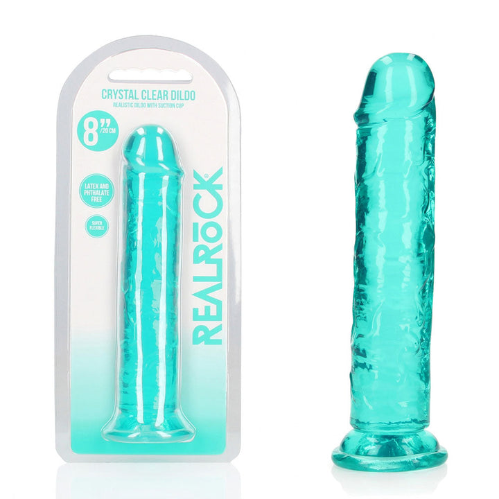 REALROCK 20 cm Straight Dildo in Turquoise, blister pack beside the jelly-clear dildo