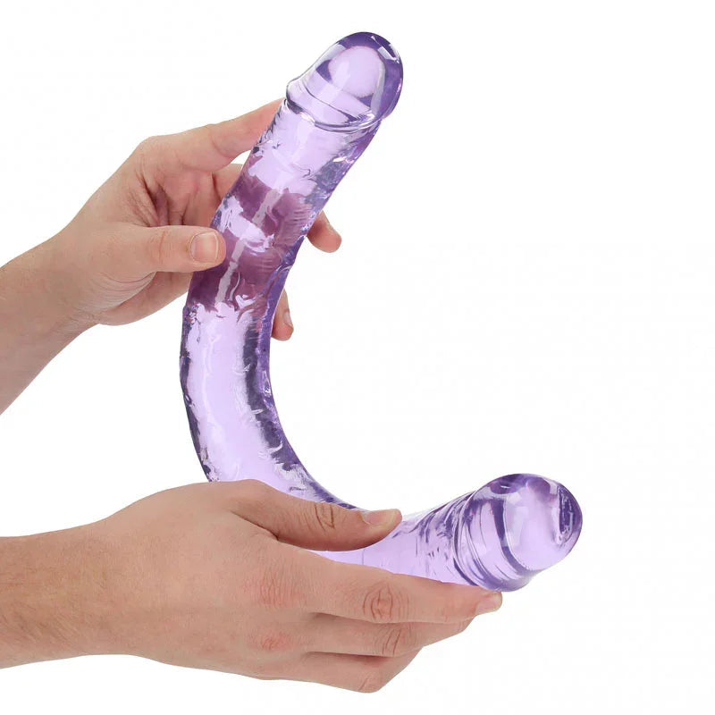 REALROCK 45 cm Double Dildo in Purple, flexed between two hands to show how far it bends